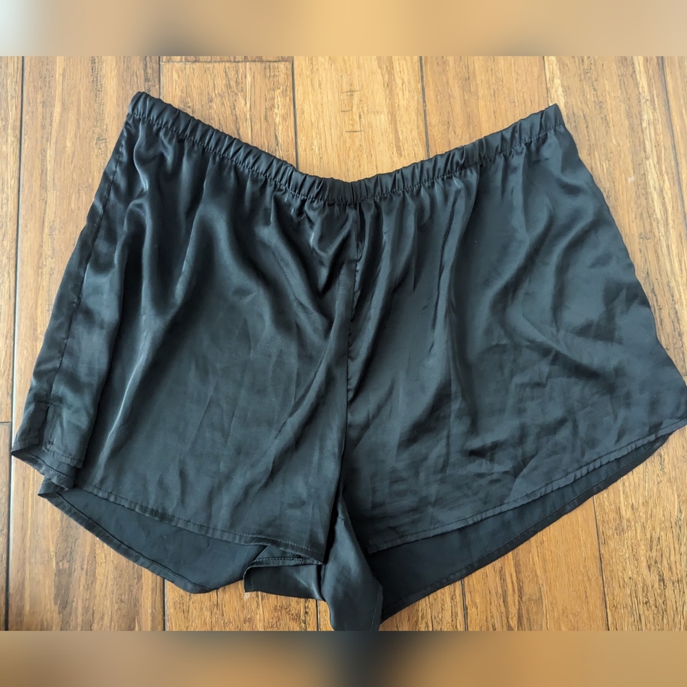 Black silk stars above shorts